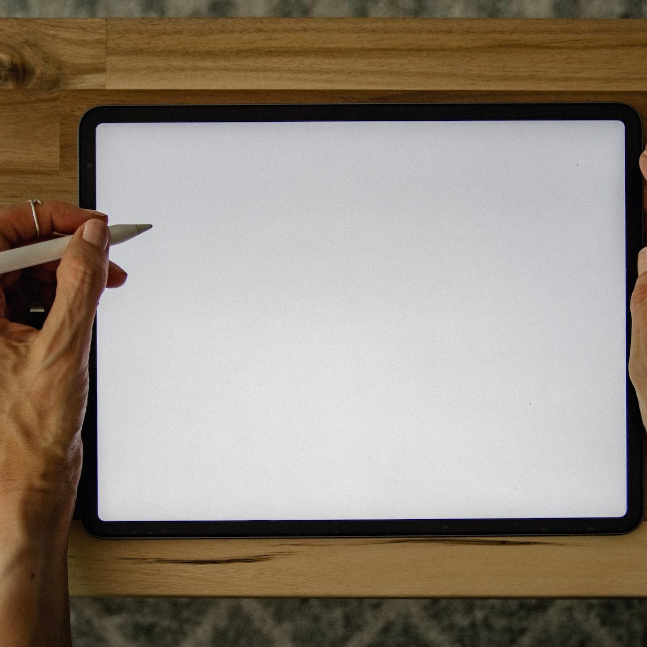 person holding white printer paper